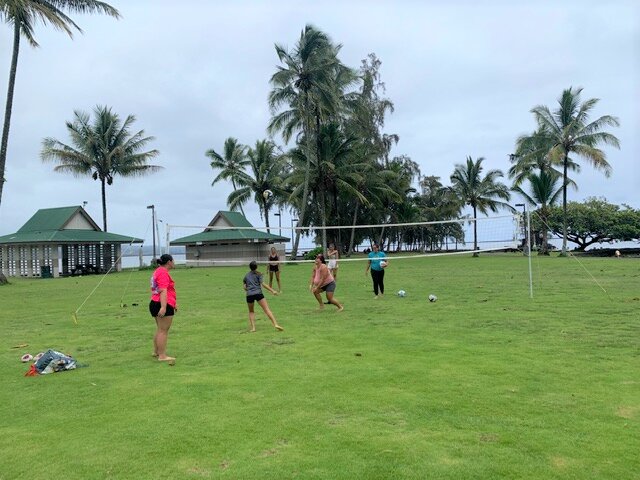 A joy filled volleyball game in hilo hawaii.